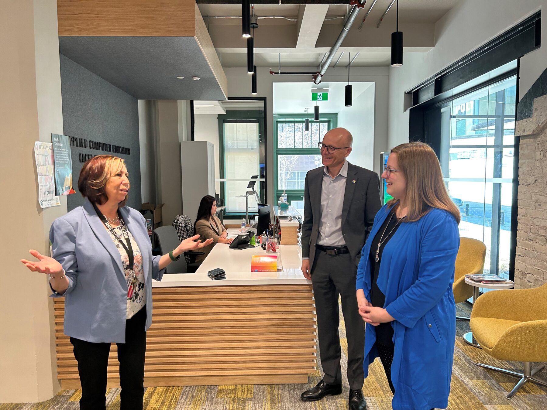 Karen Kabel, Associate Dean of Creative Arts and ACE with Fred Meier, President and CEO, tour  Minister of Advanced Education and Training, Sarah Guillemard through ACE Project Space.