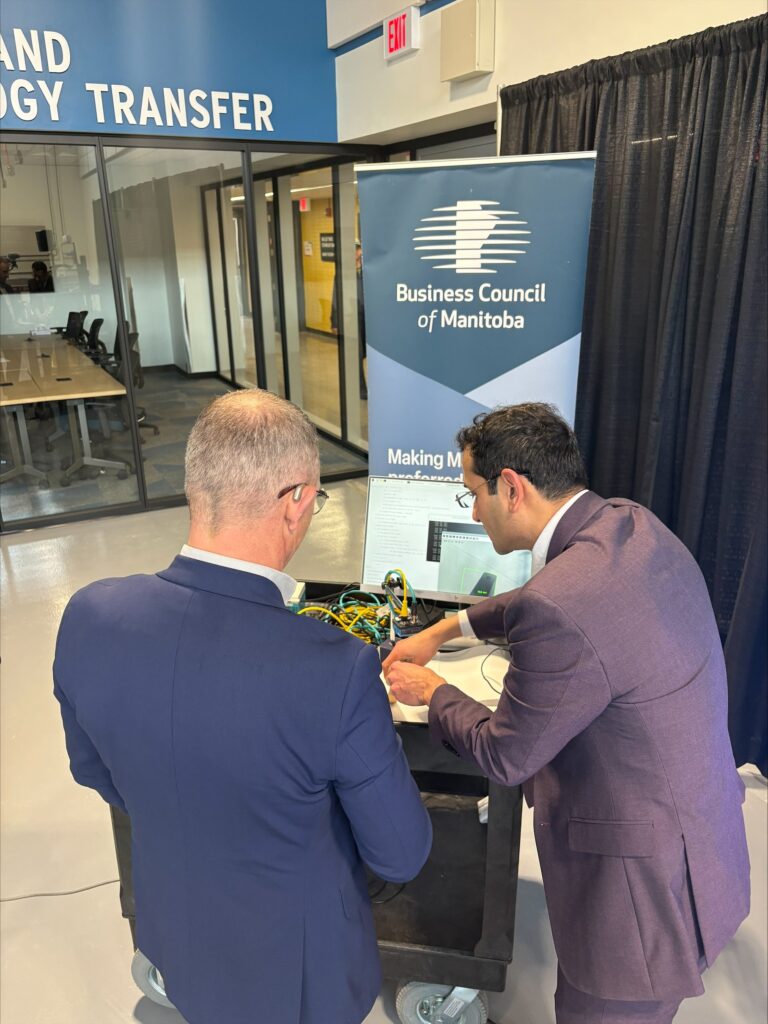 a person demonstrating electrical components to another