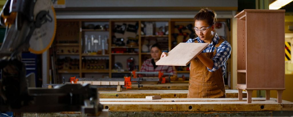 Woman in carpentry shop