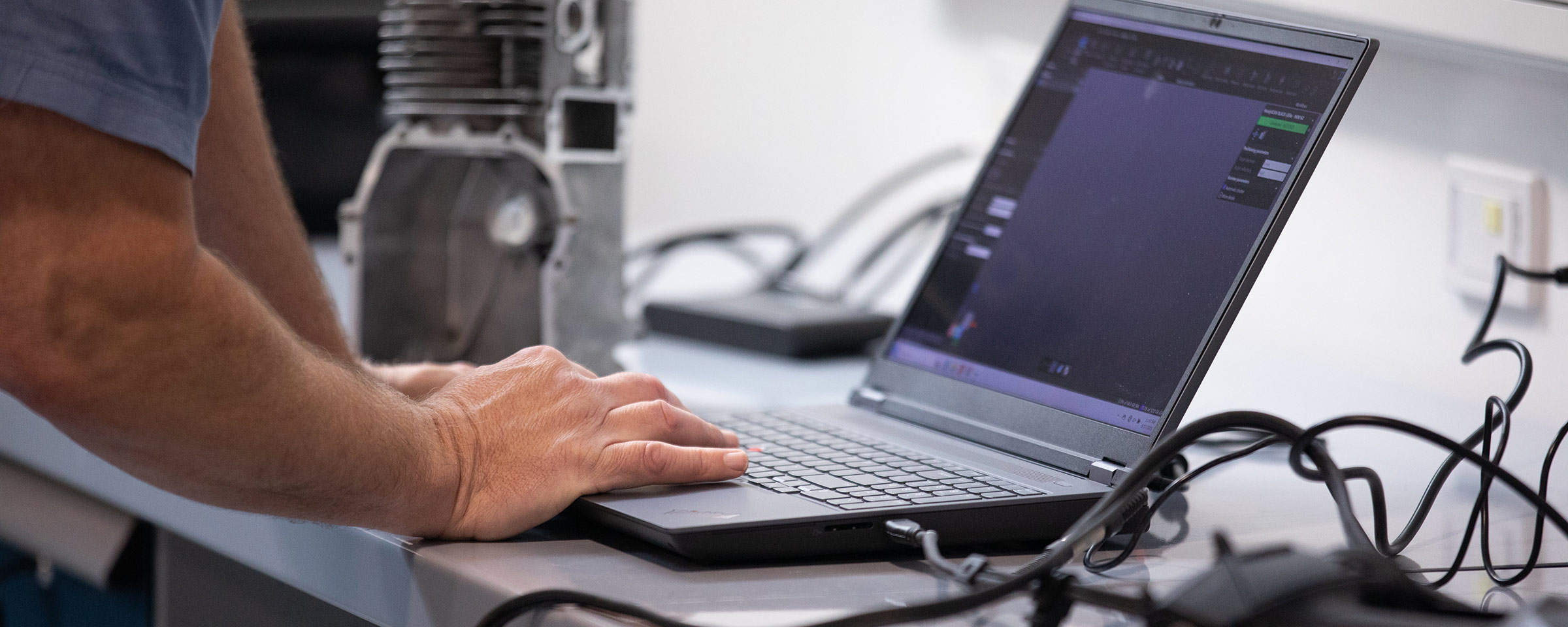 Person typing on a laptop