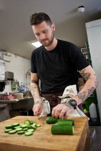 Adam Donnelly preparing food