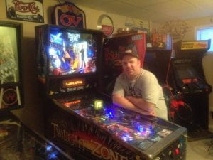 Eric Swanson with pinball machines