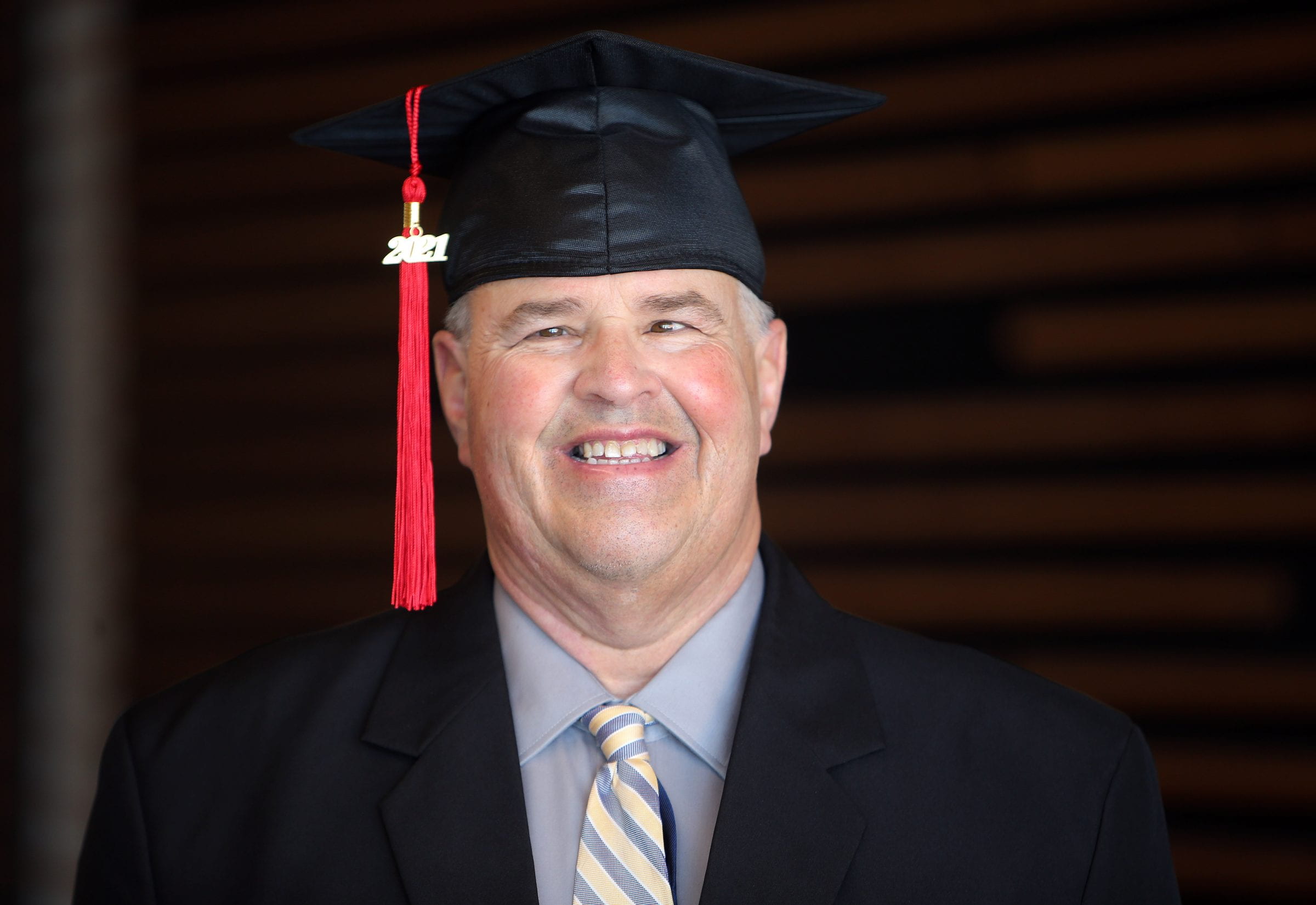 Red River College Polytechnic Honorary Diploma recipient Gabriel Langlois in graduation cap with tassel