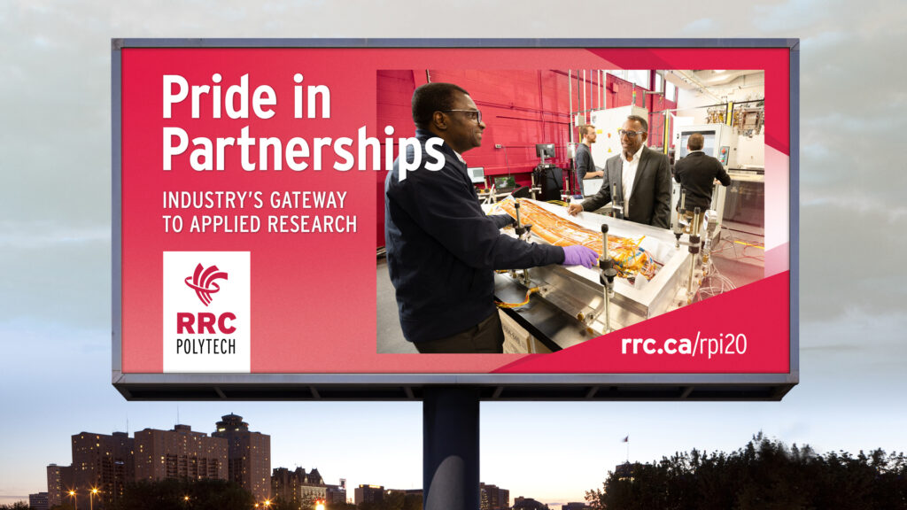 A billboard promoting RRC Polytech's Pride in Partnerships featuring people inspecting digital technology in a smart lab