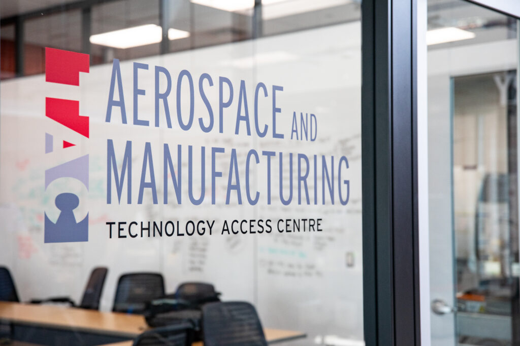 Technology Access Centre for Aerospace and Manufacturing window sign