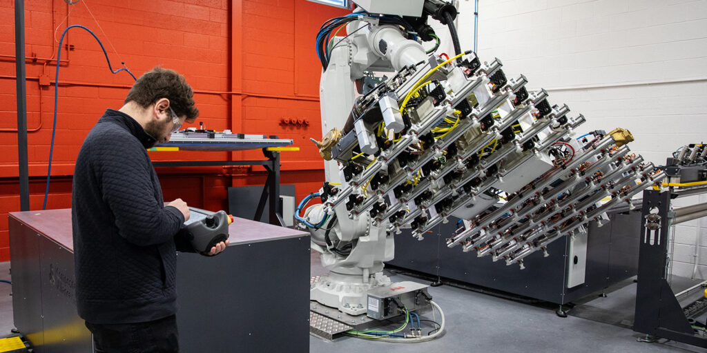 Man controlling a robotic device