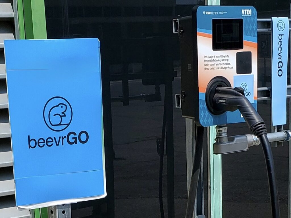 close up of an electric vehicle charging station with BeevrGO signage