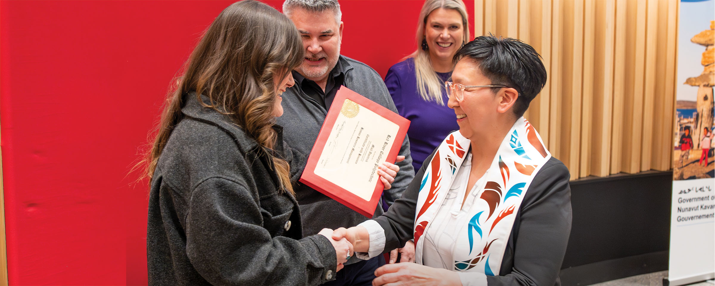 Government of Nunavut custom training student receiving graduation certificate