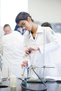 Woman mixing chemicals