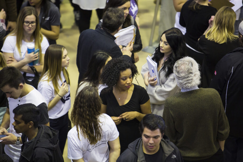 People interacting at an event