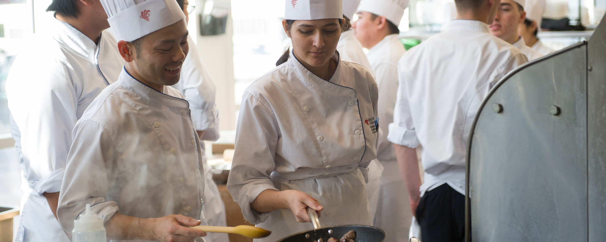 Students in a commercial kitchen