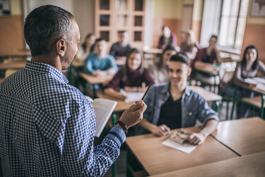 Teacher talking to classroom full of students