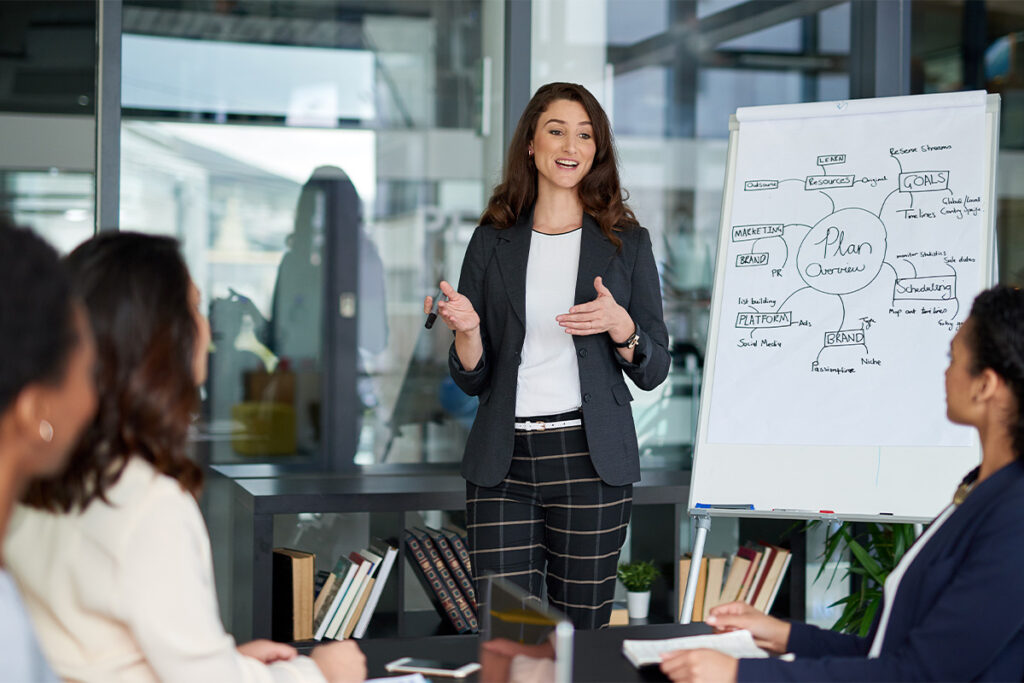 Woman giving a presentation to a class