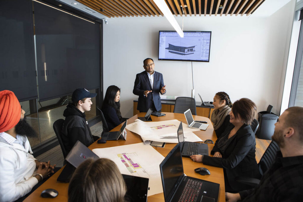 Man giving presentation in a boardroom