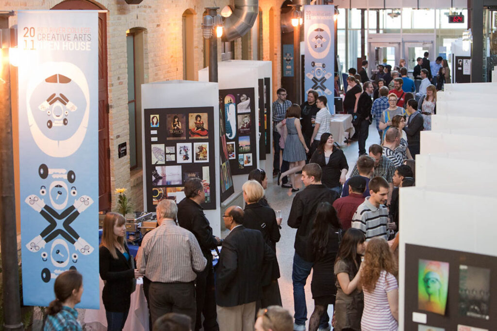 People mingling at a large art show