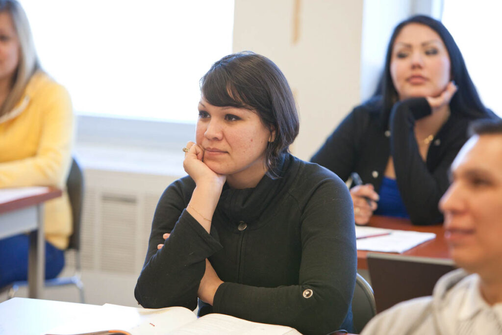 Woman sitting in a classroom