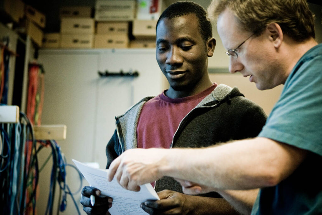 Instructor going over notes with a student