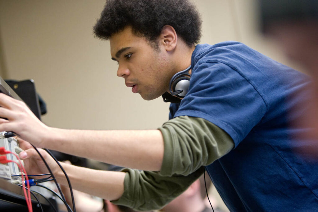 Student working in an electronic engineering lab