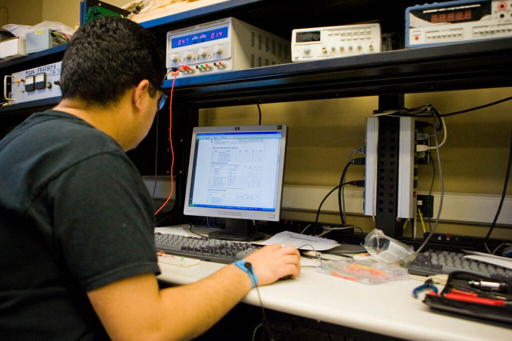 Student in an engineering lab working on a computer