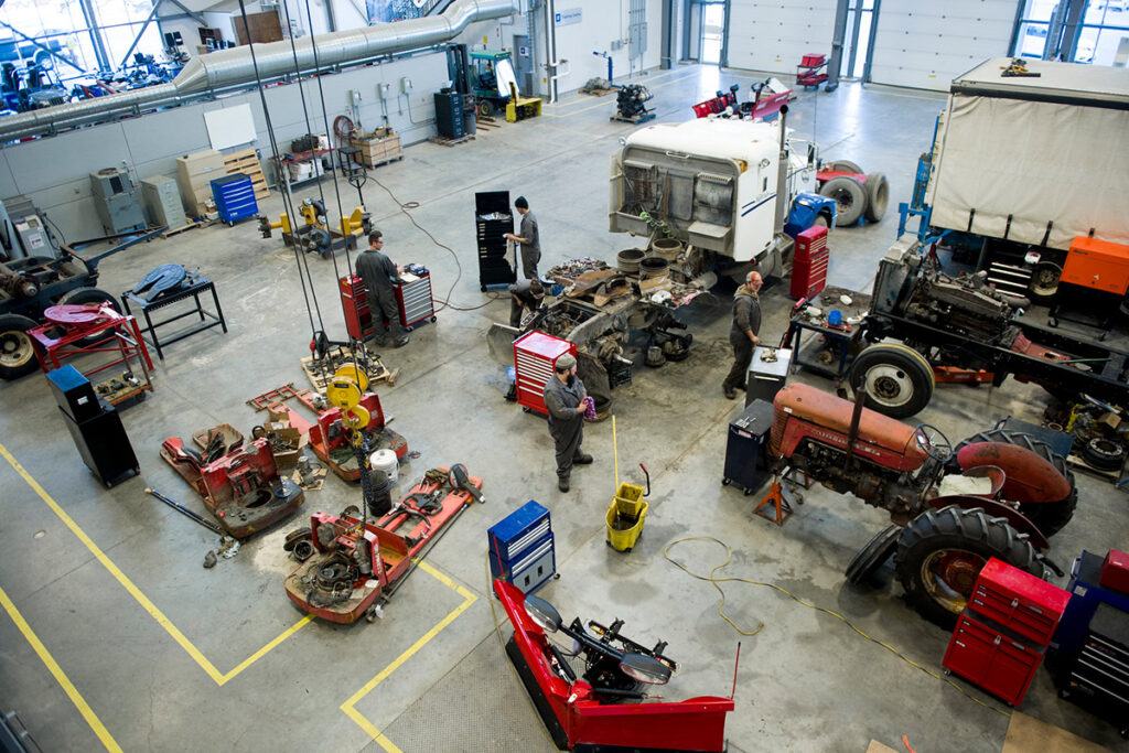 Bird's eye view of a mechanic's shop for large equipment like tractors