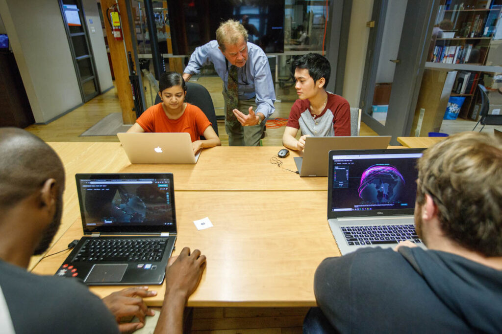 Instructor talking to students in a classroom