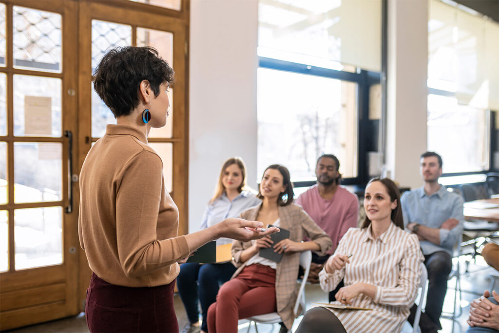 Instructor talking to a classroom of students