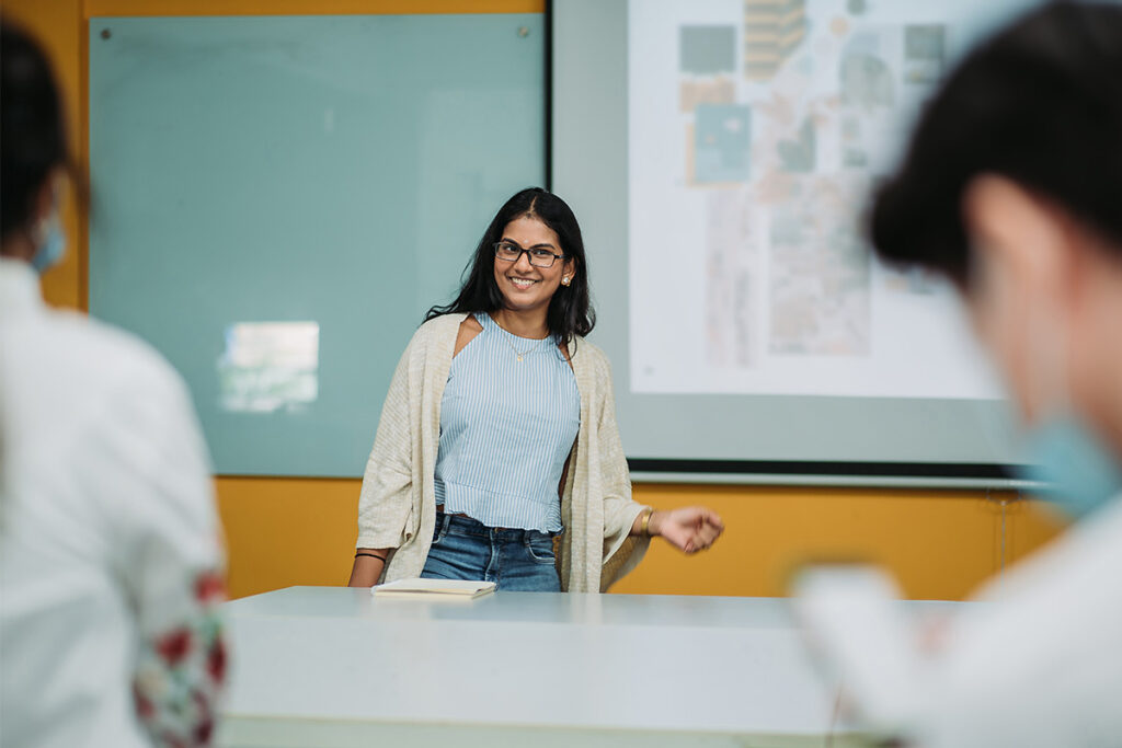 Woman making a presentation to a class