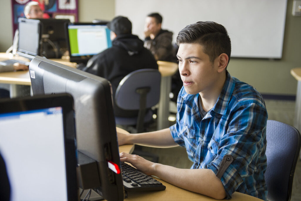 Student working on computer in computer lab