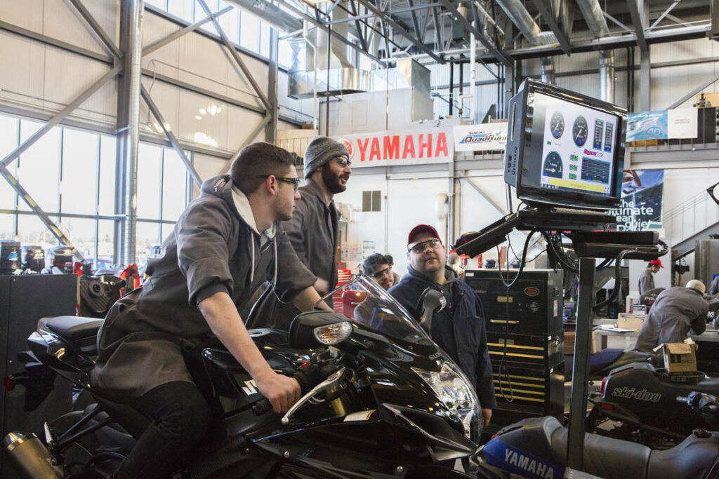 Students running tests on a jetski