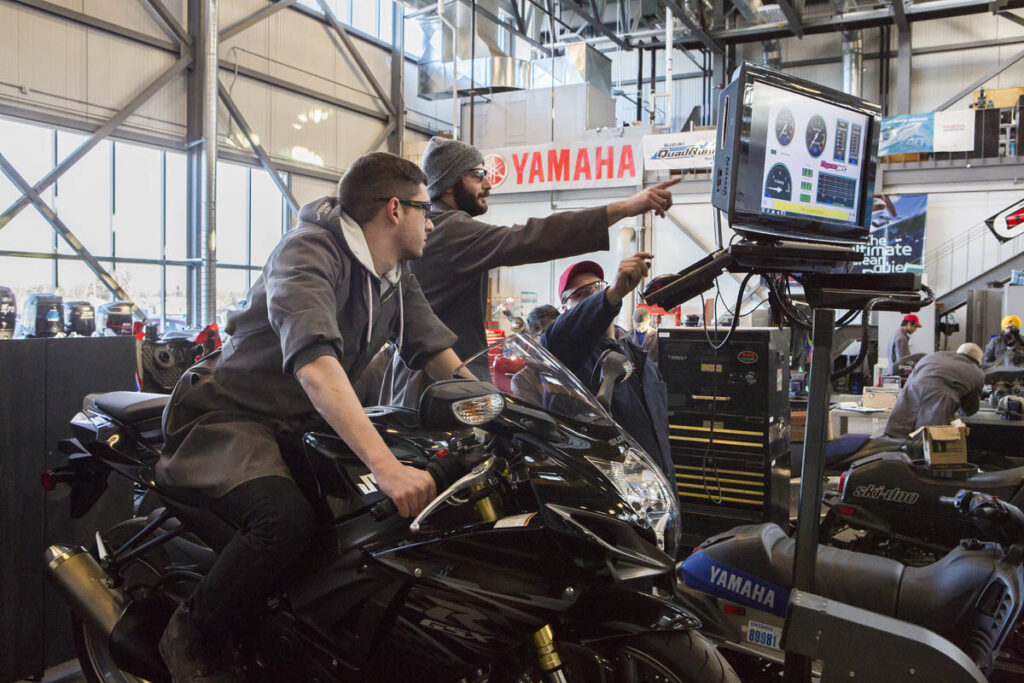 Students running tests on a jetski