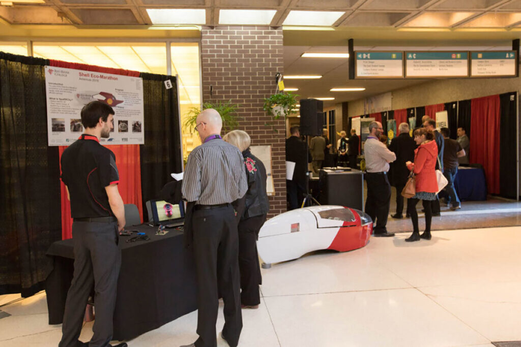 People milling about at an industry showcase event