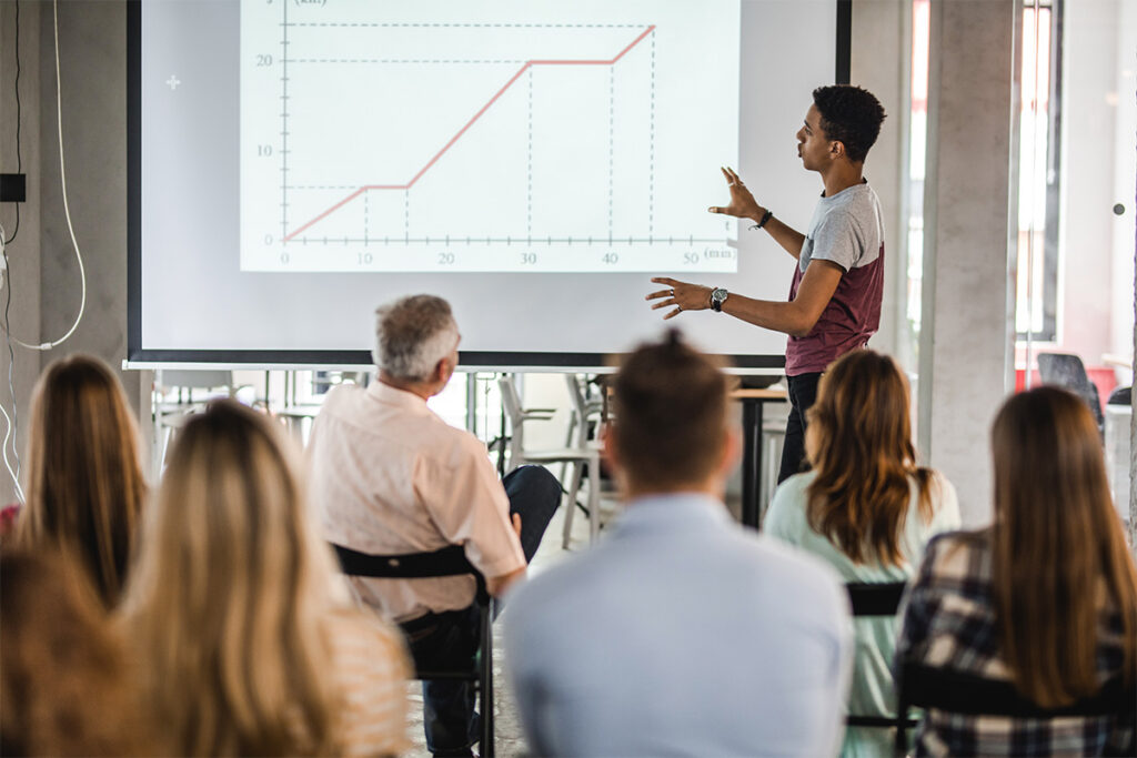 Instructor making presentation to students 