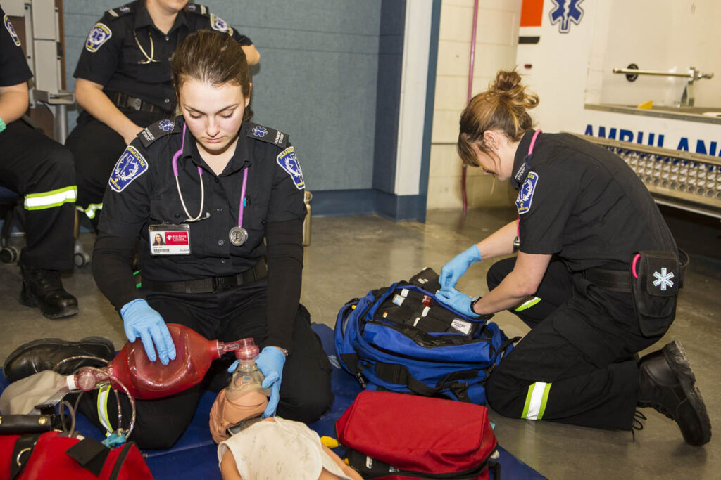 Paramedic students practicing intubation techniques