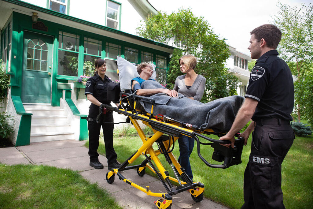 Patient getting wheeled along on a stretcher