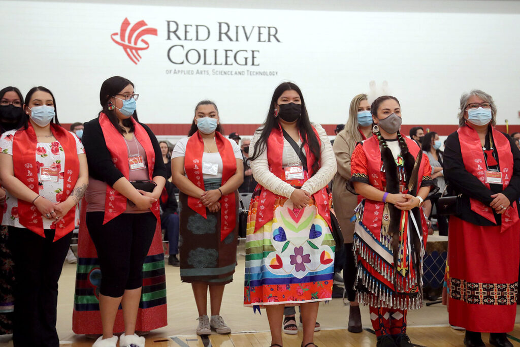 Students being honoured at the graduation Pow Wow