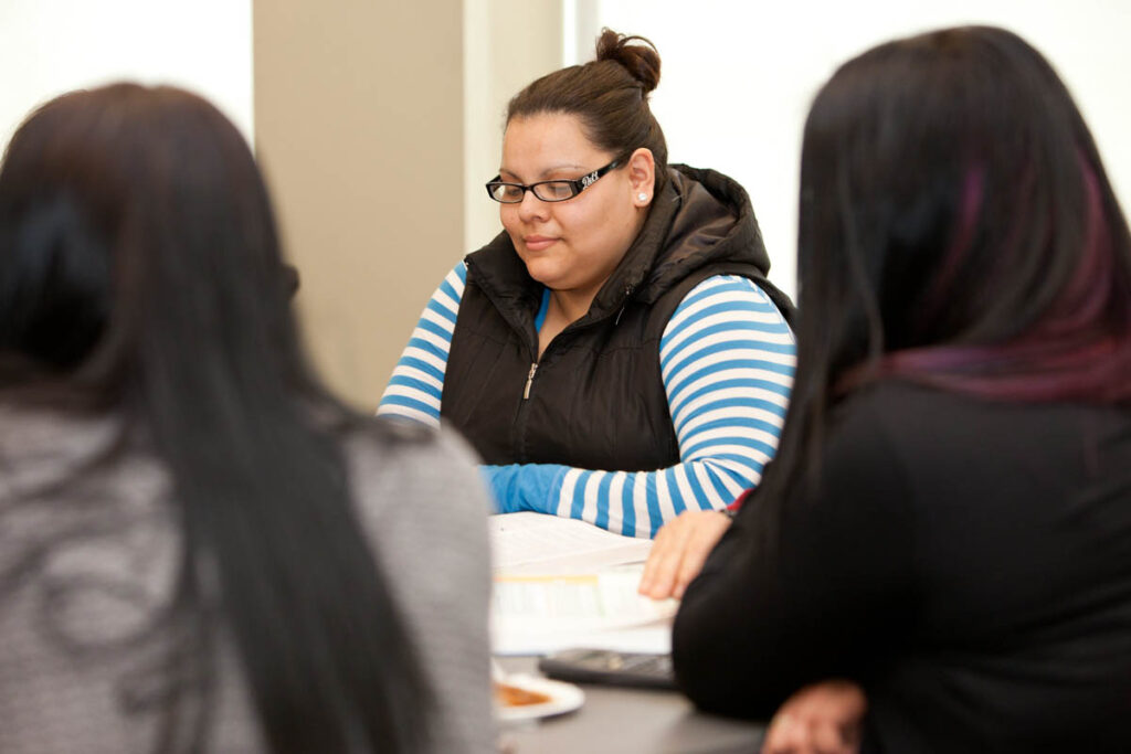 Woman sitting in classroom