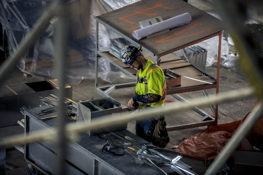 Man in safety vest at construction site