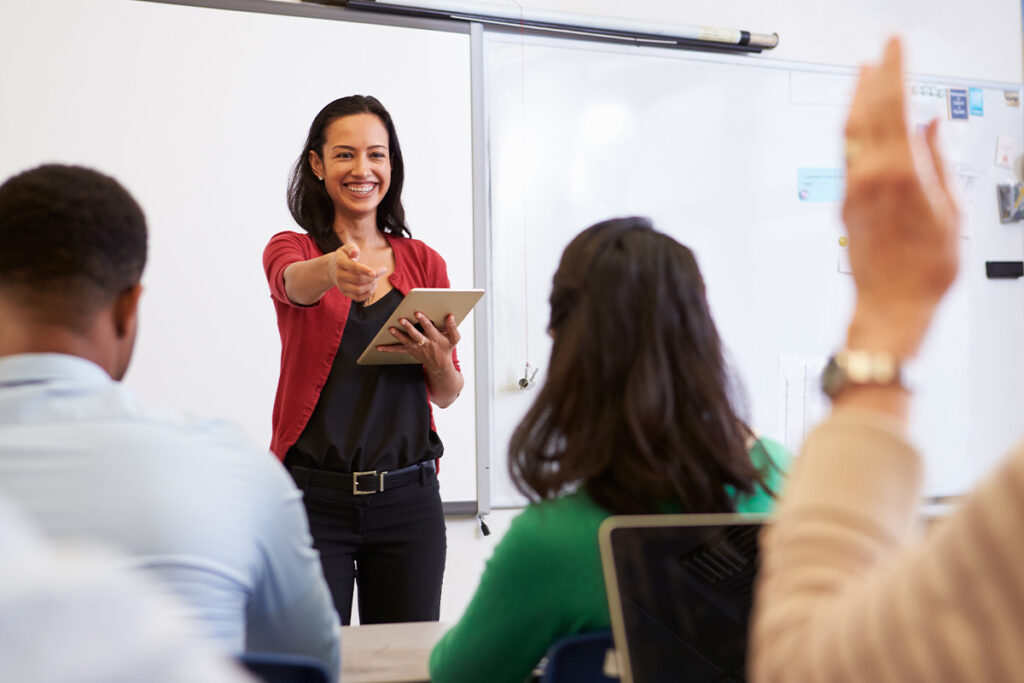 Instructor talking to students in a classroom