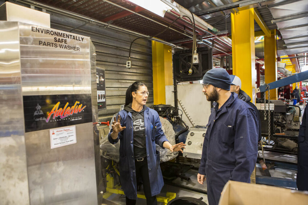 Student and instructor in a commercial garage