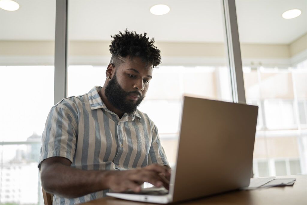 Man in front of laptop