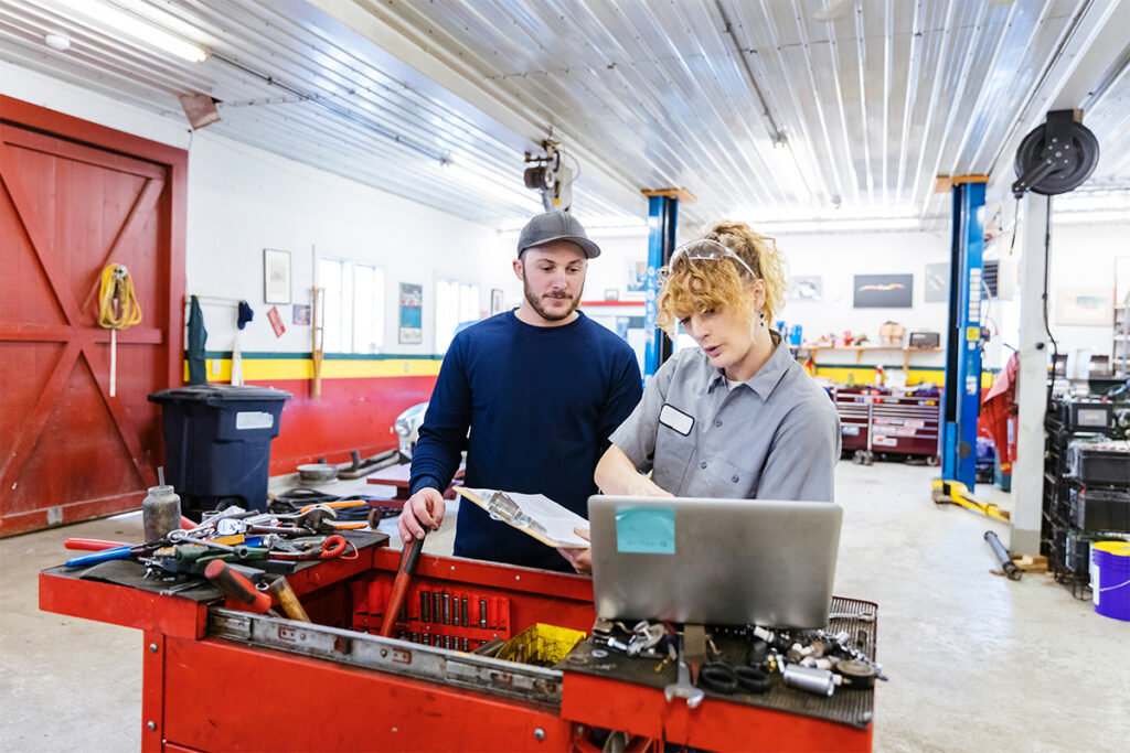 Students working in a garage