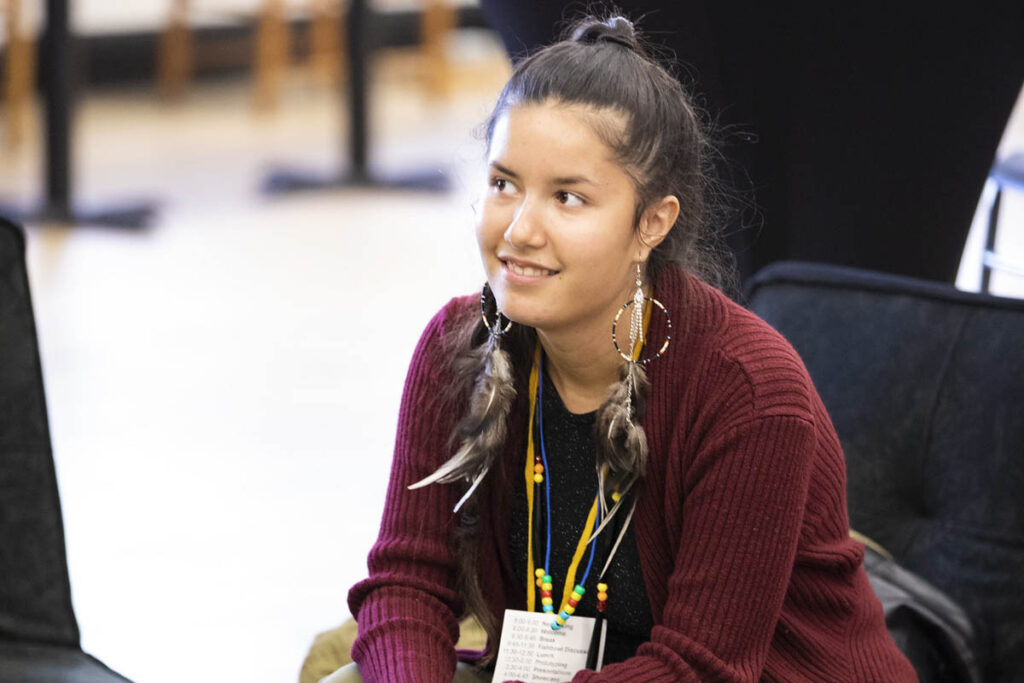 Student sitting in a chair in a classroom