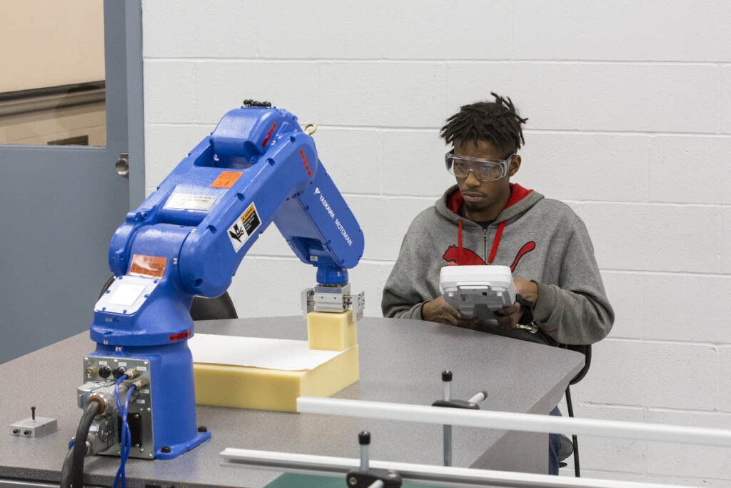 Student working on robotics