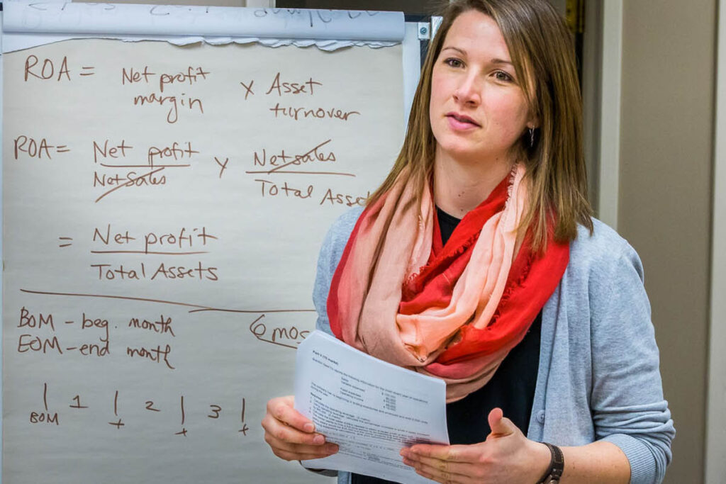 Teacher standing in front of a whiteboard