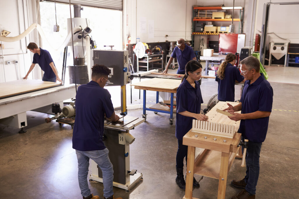 Students in a wood shop classroom