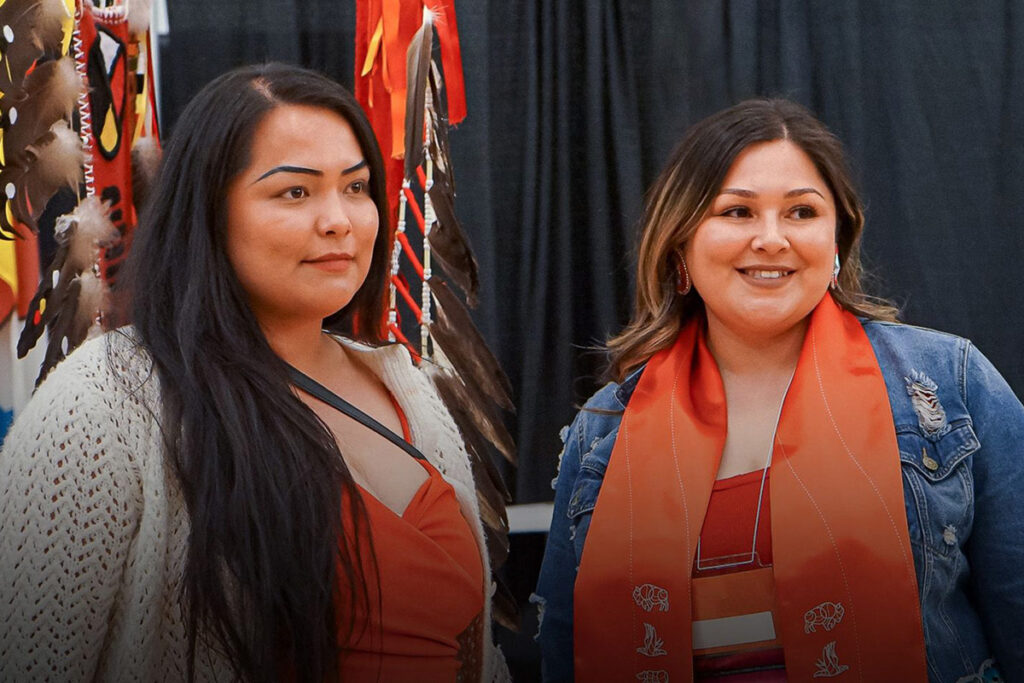 Two women at Indigenous graduation ceremony