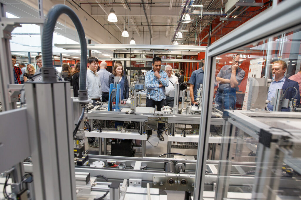 People standing in manufacturing laboratory 