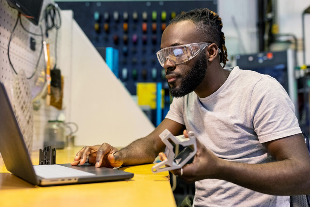 Man sitting in front of laptop