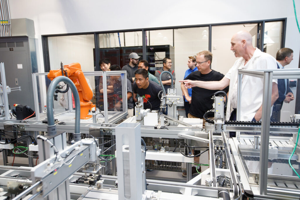 Group of people in robotics laboratory