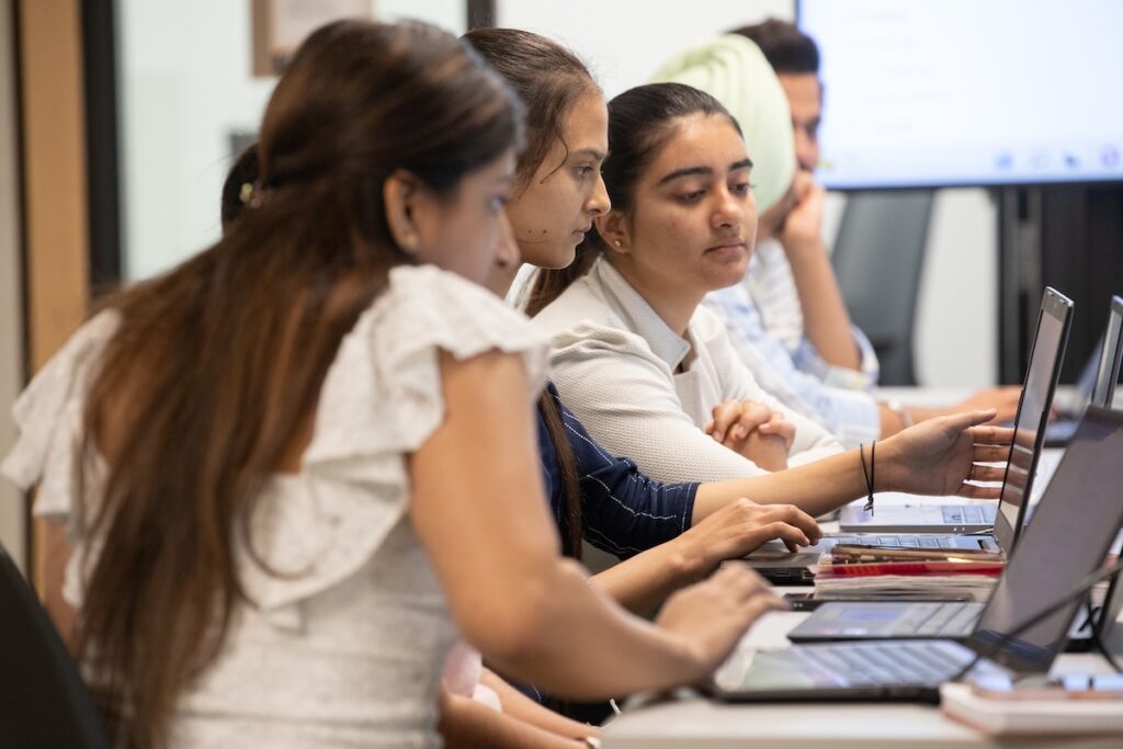 Students working in applied research project at the ACE Project Space
